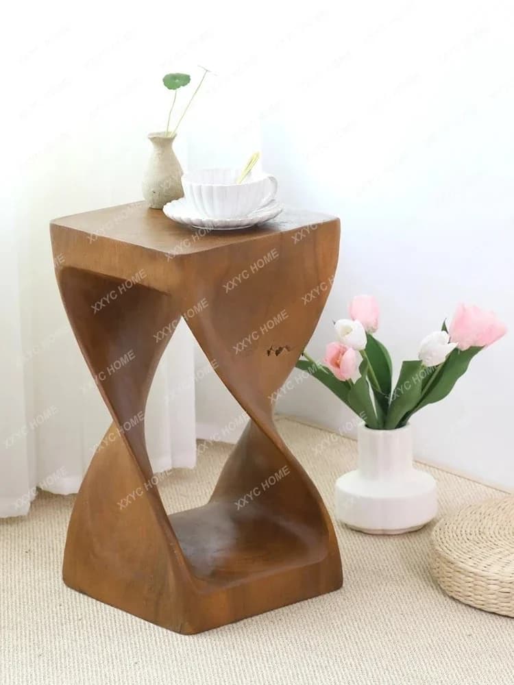 Un legno massello tailandese un blocco di legno o pietra sgabello basso tavolino in legno sgabello creativo ceppo di legno per intaglio di radici