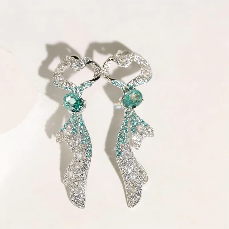 Orecchini Bellux in argento 925 con paraiba verde sintetica sfumata, design a fiocco, per donna.