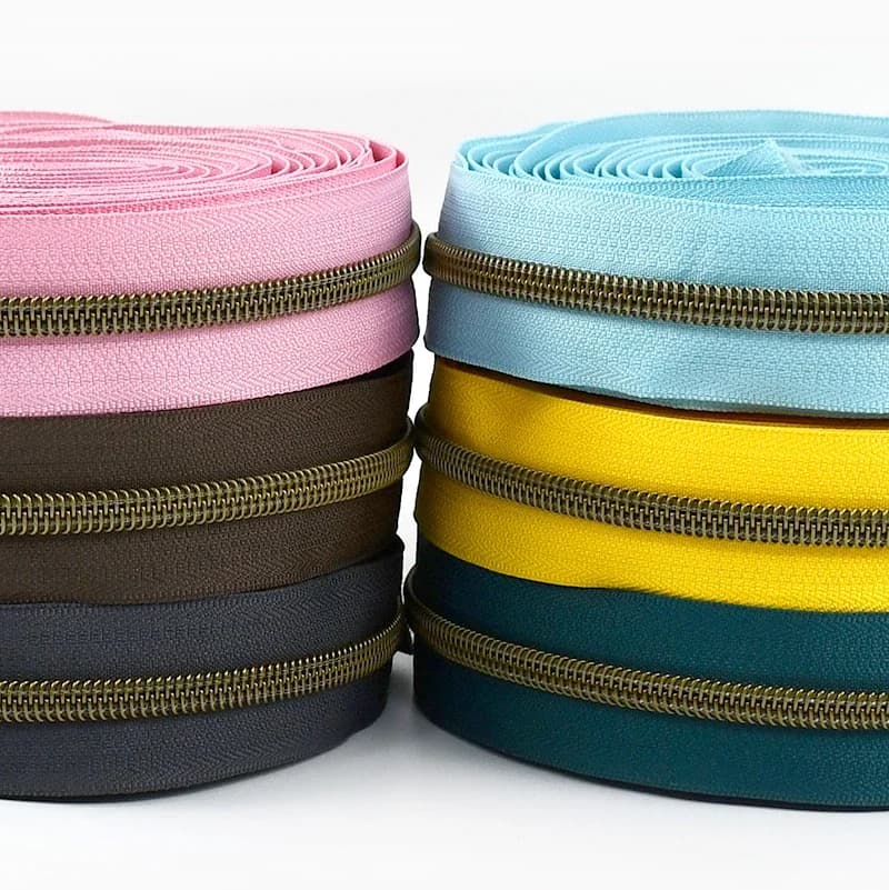 1-10M 5 # Nastro per cerniera in nylon Denti in bronzo Bobina Ziper Roll Vestiti Cerniere in plastica per metri Chiusure per borse Zampe per riparazioni di cucito