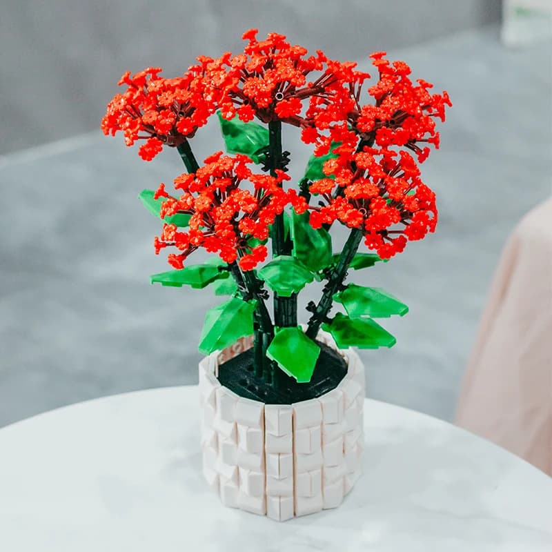 Un regalo per gli amici dal soggiorno e decorazioni per la camera da letto di blocchi di costruzione, fiori eterni e niao luo