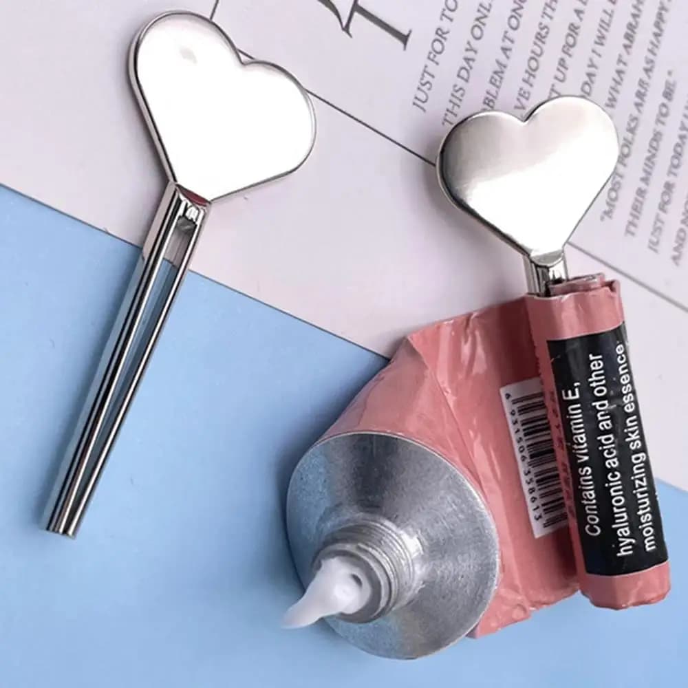Pratico tubo manuale spremiagrumi set di rulli chiave dispenser accessori per il bagno persone pigre utile dentifricio a forma di cerchio di cuore