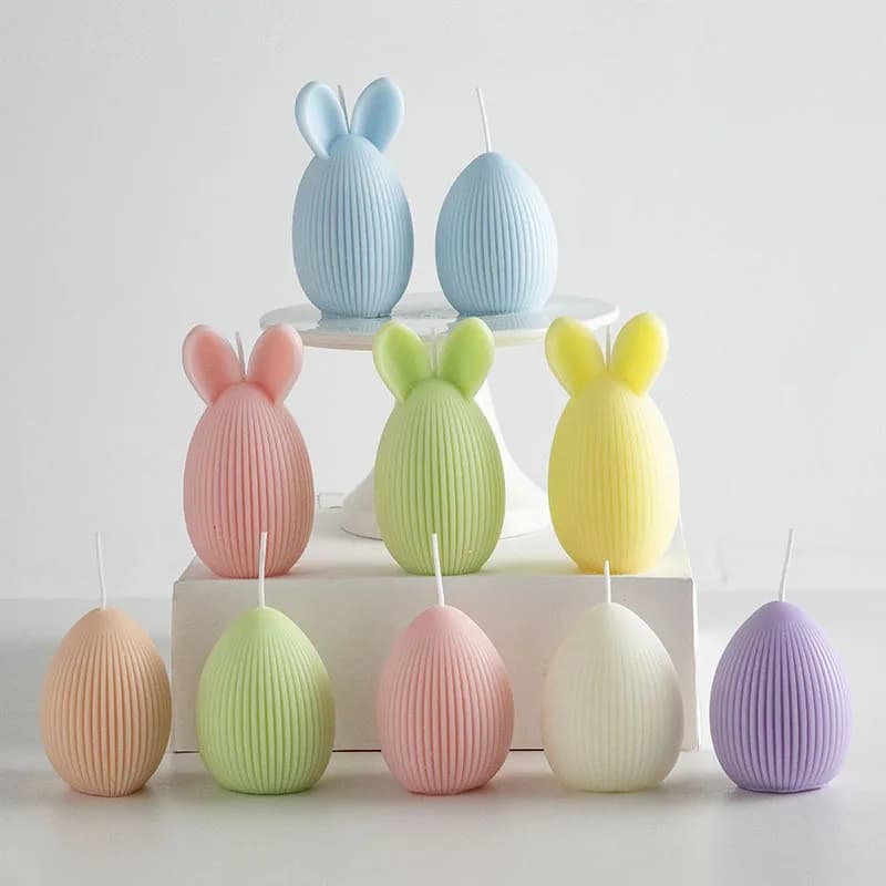Easter eggs, aromatic candles in the shape of mini bunny, creative decoration for a festive atmosphere.