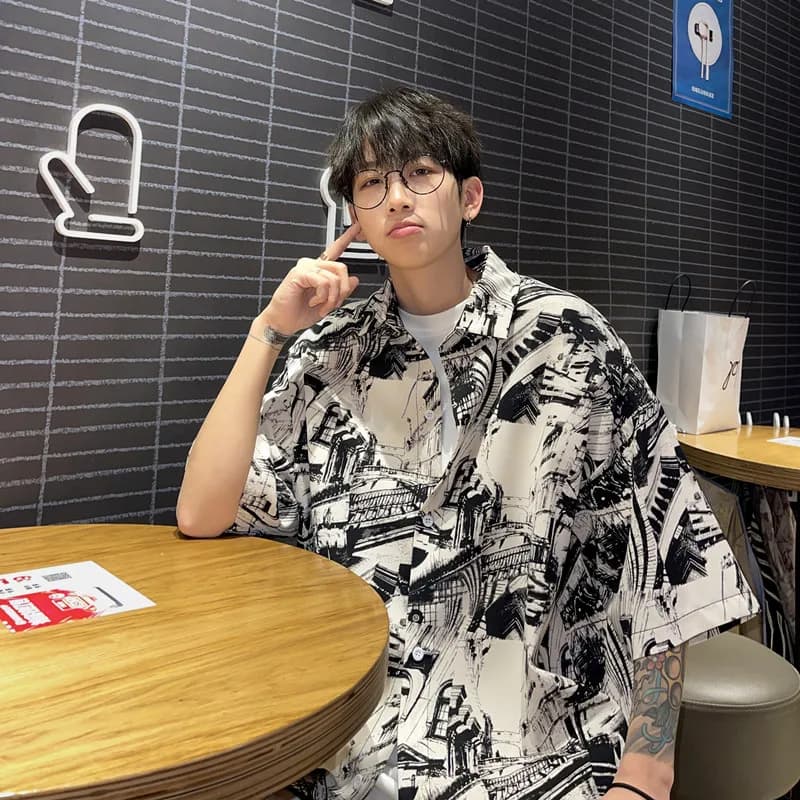 Summer ort Sve Men's irt Water Ink Diffusion Beach Sle Thai Flower Print Casual Loose Fit Faionable Youth
