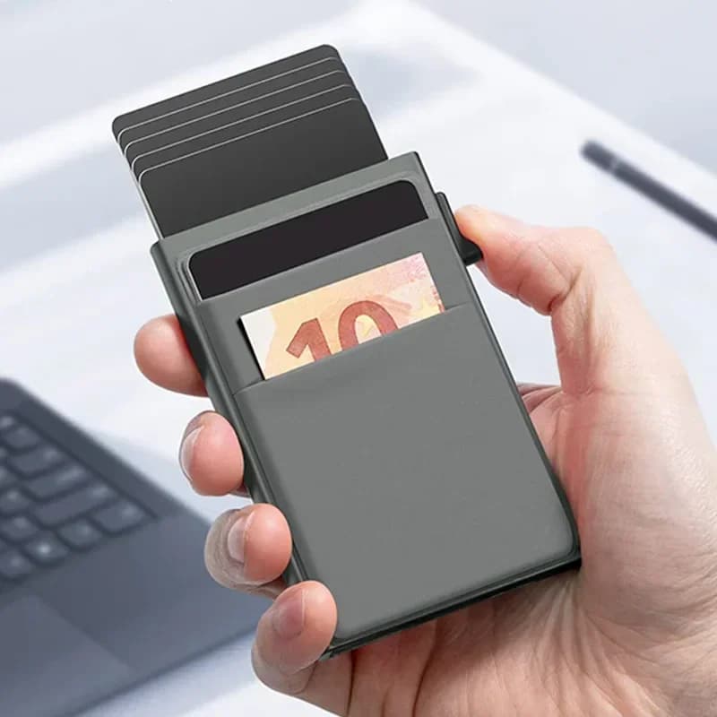 Portafoglio in metallo sottile e minimalista con protezione RFID anti blocco per carte di credito e documenti, con meccanismo a comparsa, per uomo e donna.