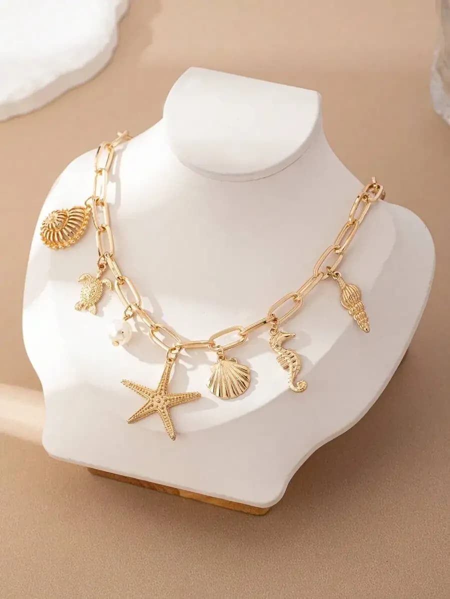 Collana con ciondolo a forma di creature marine con stella marina, cavalluccio marino, conchiglia e tartaruga per donna