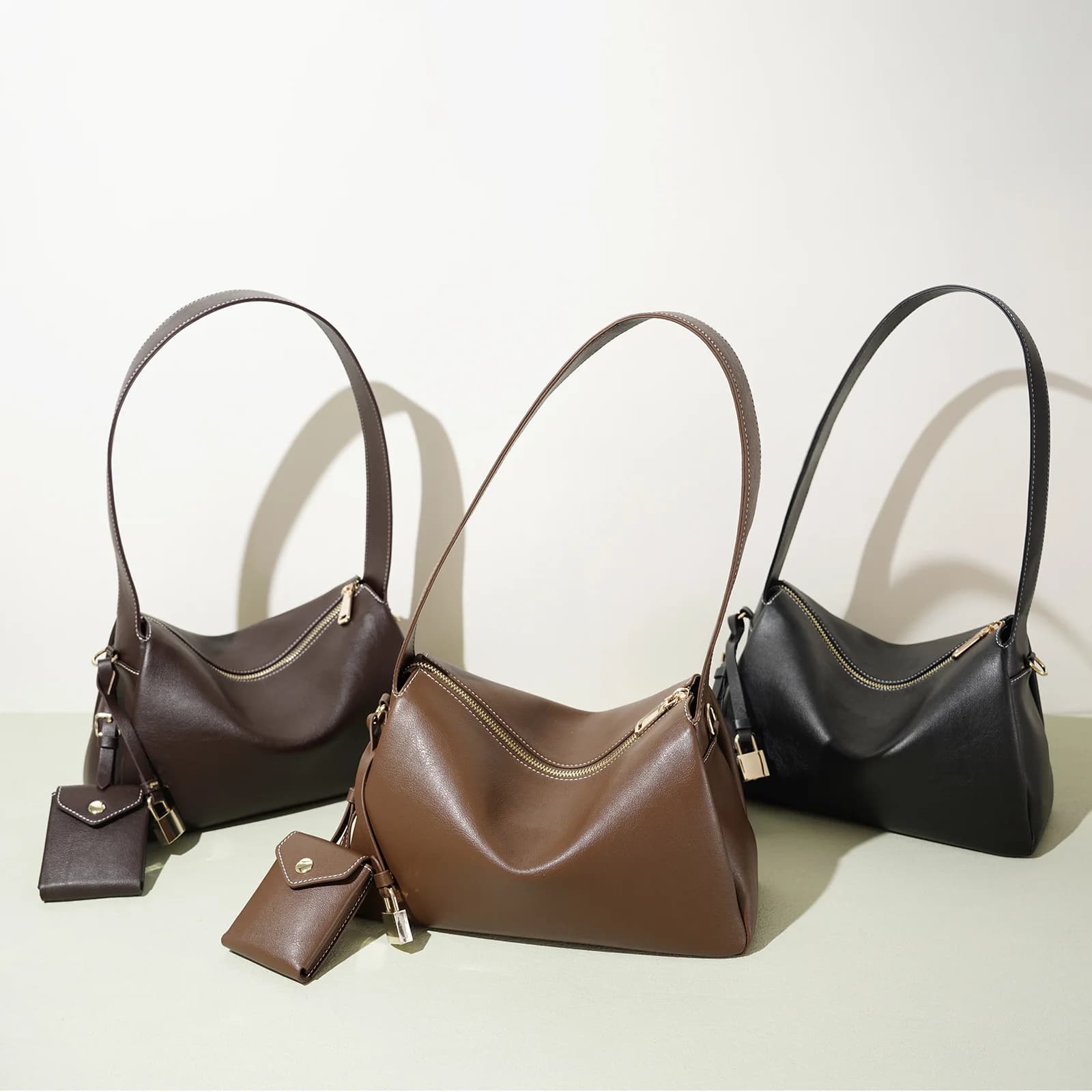 Inizio primavera 2026 Borsa a tracolla versatile per pendolari Borsa elegante da donna in pelle Borsa a tracolla per madre-bambino con pezzo pendente