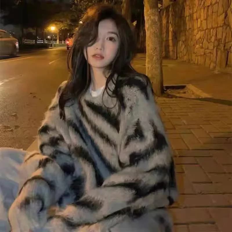 Maglione da donna alla moda Abbigliamento casual con maglione ceroso con stampa leopardata Autunno e inverno Nuovo maglione pigro sciolto sull'outsi