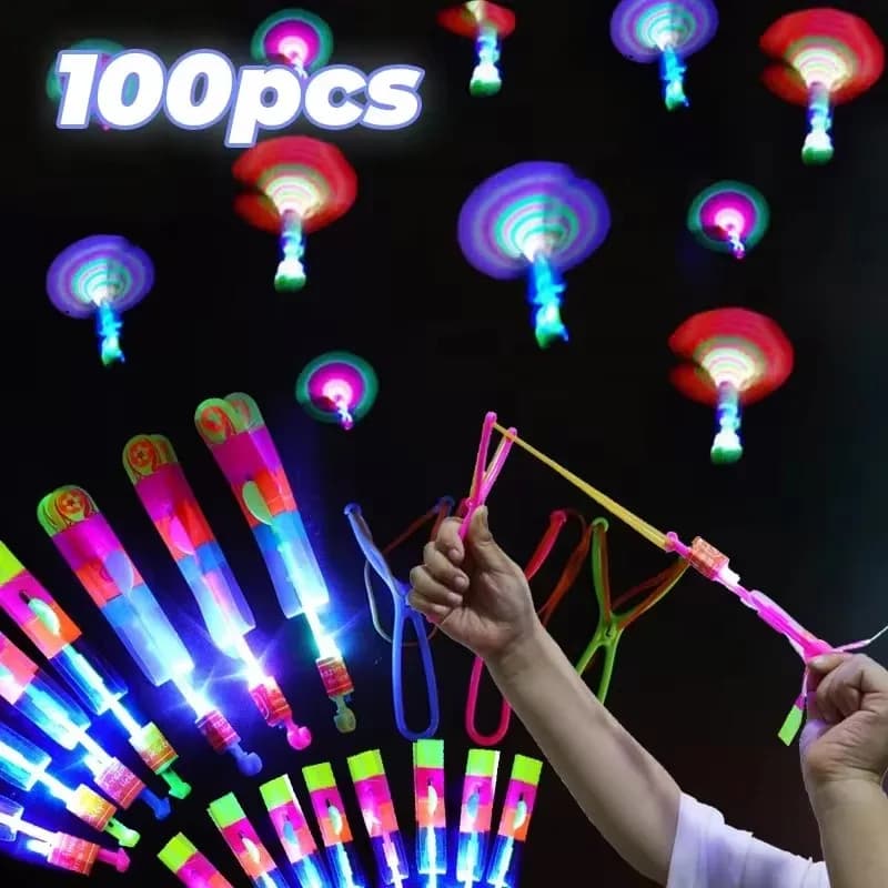10/20/50/100pcs incredibile luce giocattolo freccia razzo elicottero giocattolo volante LED luce giocattoli festa divertente regalo elastico catapulta