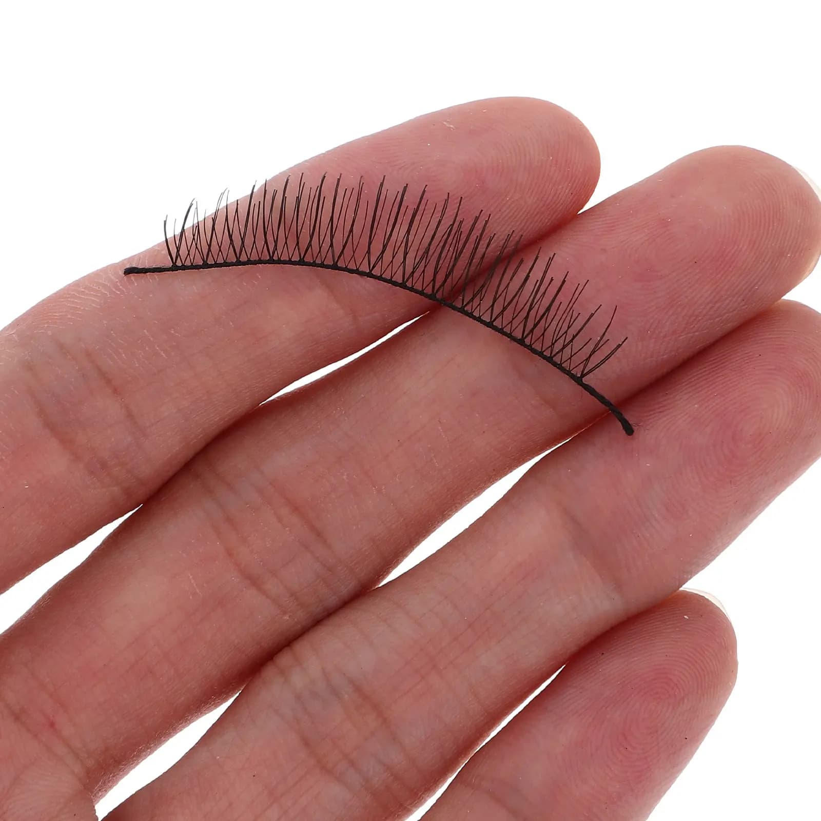 10 pairs of soft, long and dense artificial eyelashes for women, handmade with applied glue, chic look for evenings outside.