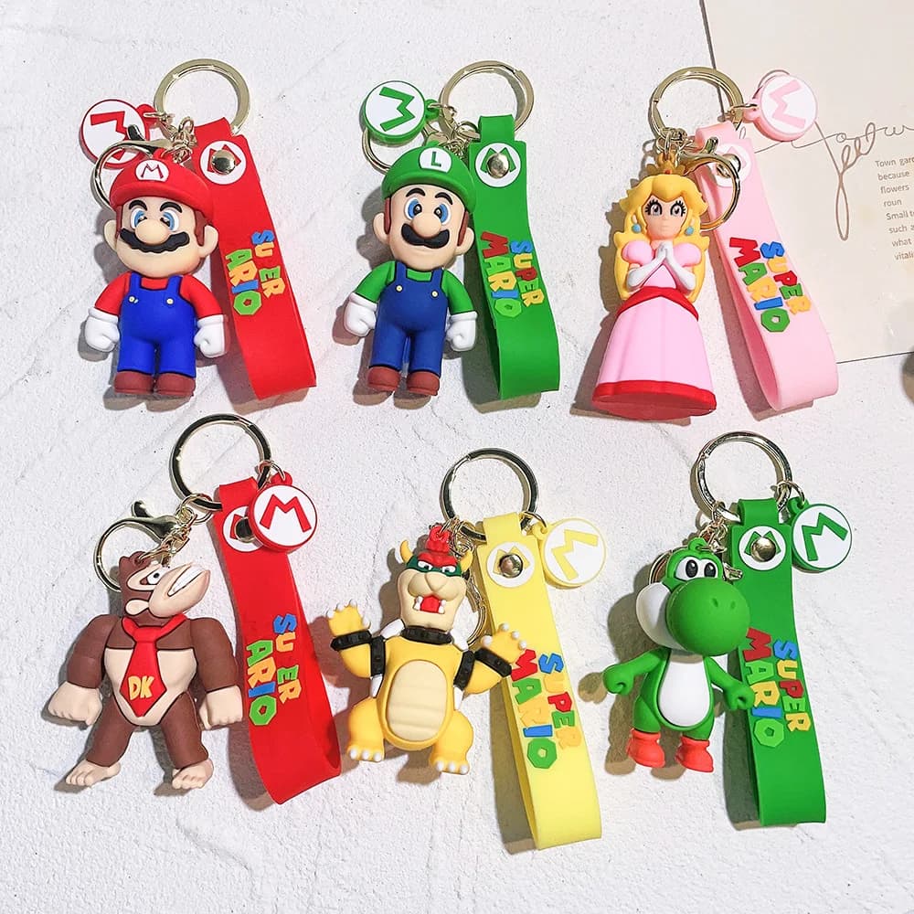 Portachiavi con Personaggi di Super Mario Bros, Ciondoli con Figure di Mario, Luigi e Principessa Peach, Charm per Zaini per Bambini e Fan