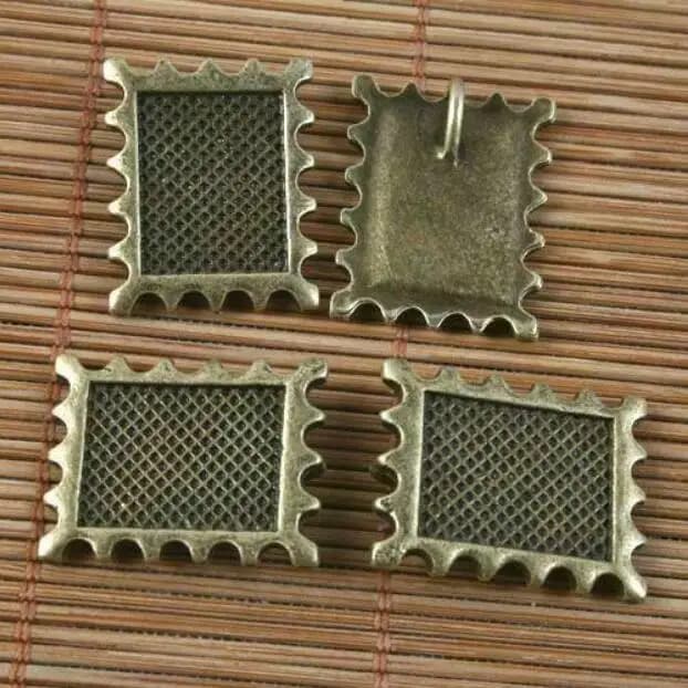Photo frame with bronze edge aged 10 pieces 23x18 mm G1606