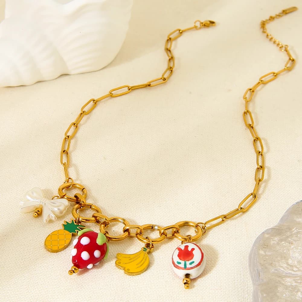 Collana con ciondolo fiore di frutta estate 2025 Ciondolo in ceramica placcata oro 18 carati su catena in acciaio inossidabile INS Gioielli di moda per le donne