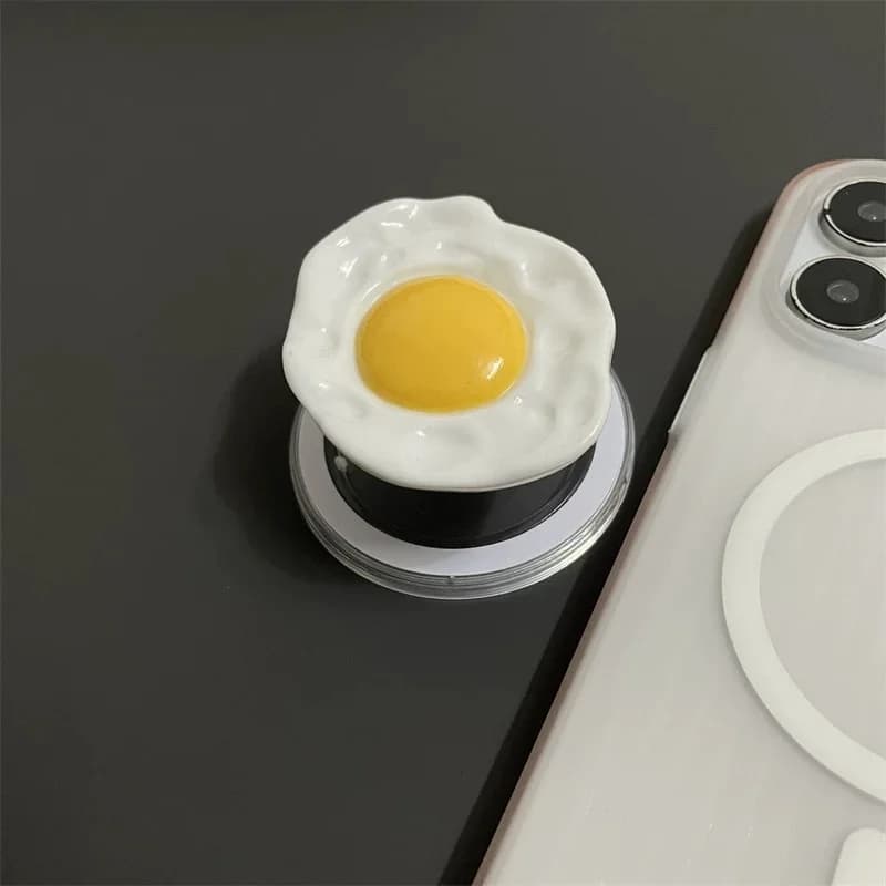 Supporto per telefono creativo per uovo per supporto Tok con presa pieghevole Magsafe per iPhone Samsung Supporto espandibile per dito con anello sicuro