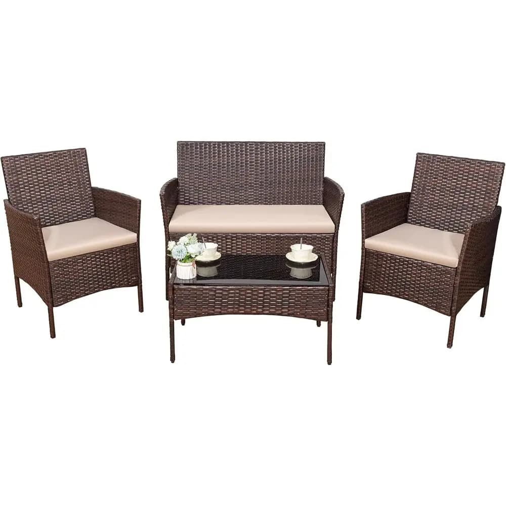 Set of outdoor garden furniture in 4 pieces with beige cushions and brown wicker chairs for balcony, lawn and porch