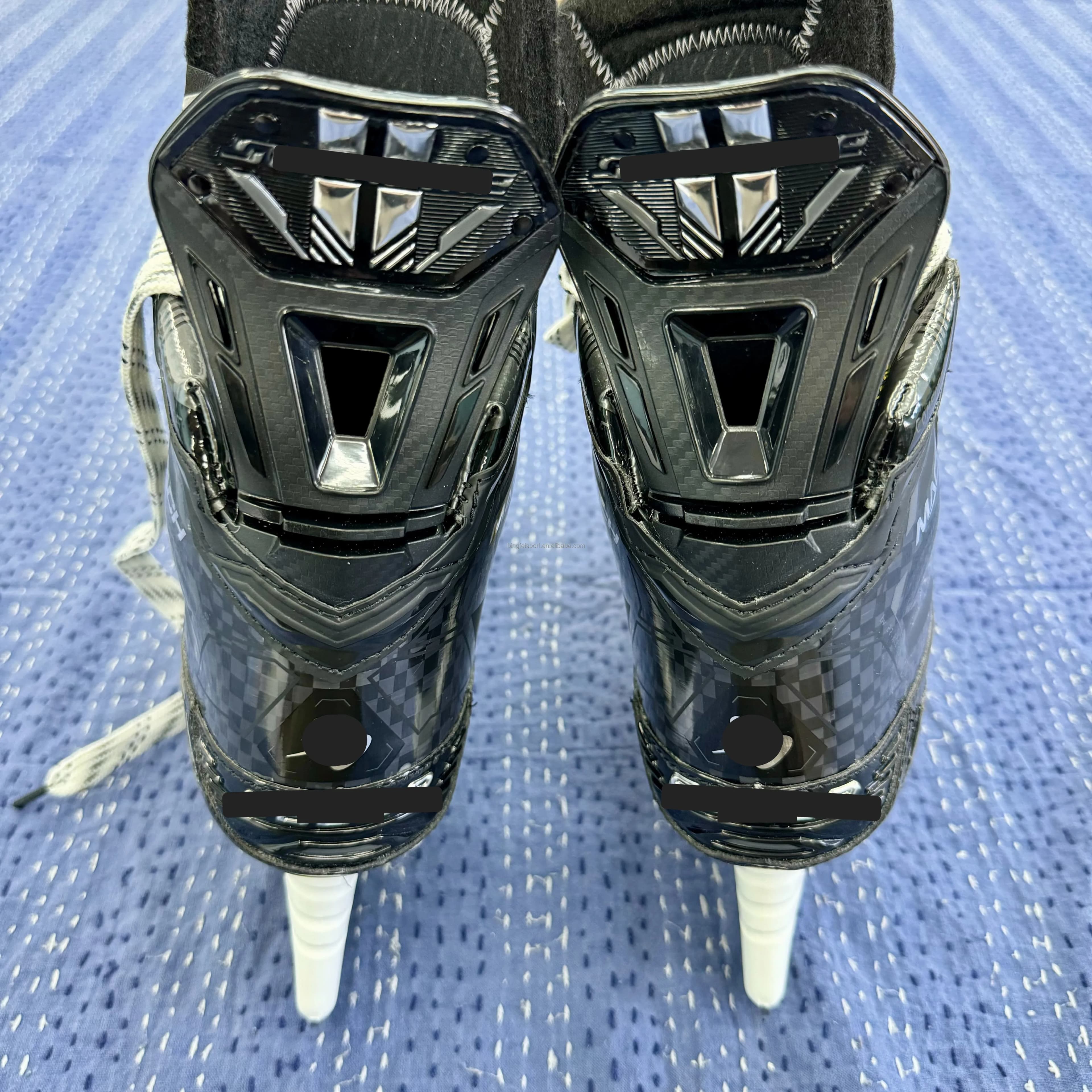 Pattini da hockey su ghiaccio curvi in fibra di carbonio Hyperlite per un massimo trasferimento e velocità di energia