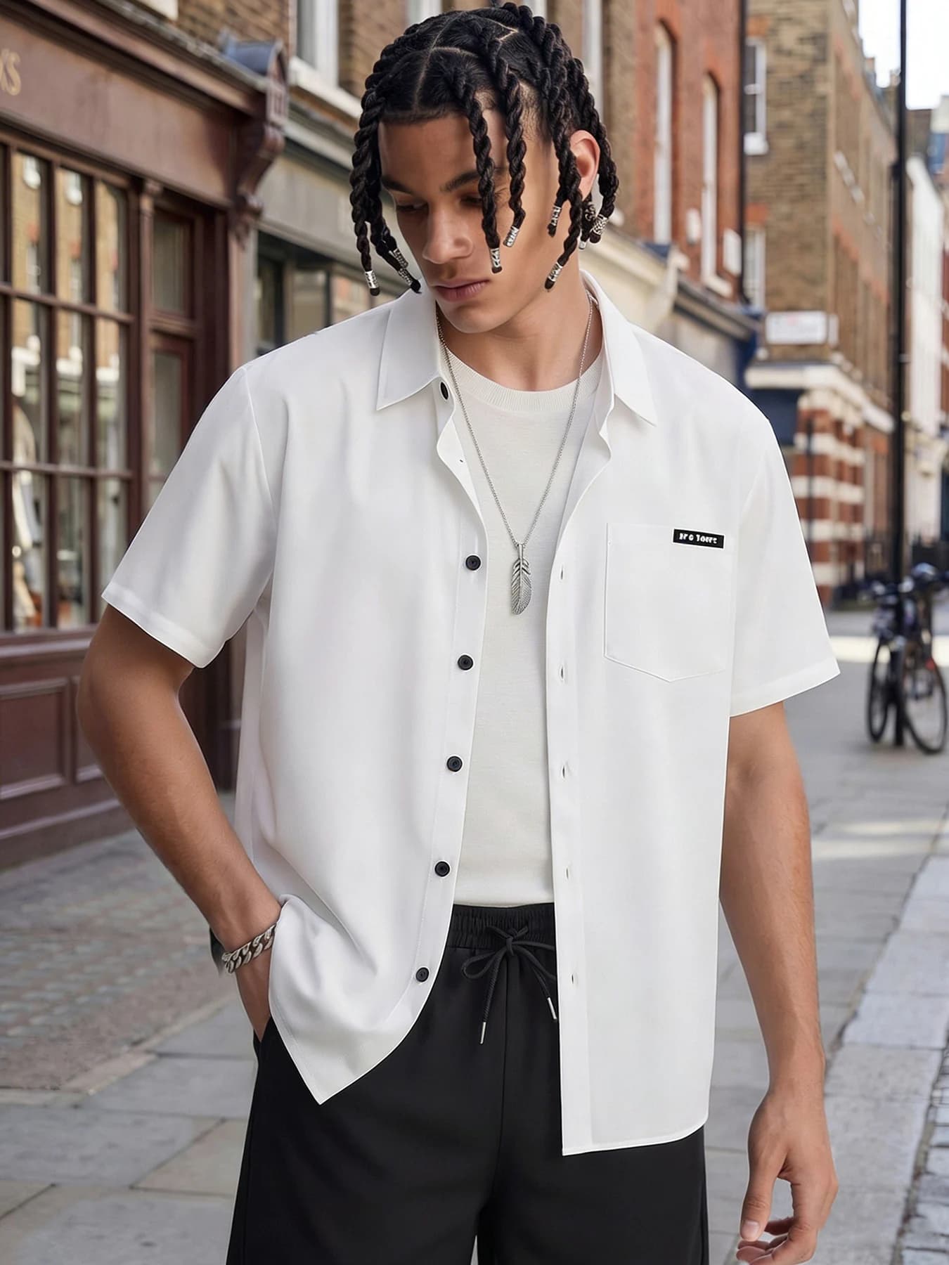 Men's Two-Piece Outfit: White Short-Sleeved Shirt with Patch Pockets Paired with Black Drawstring Shorts, Solid Color Casual Summer Set