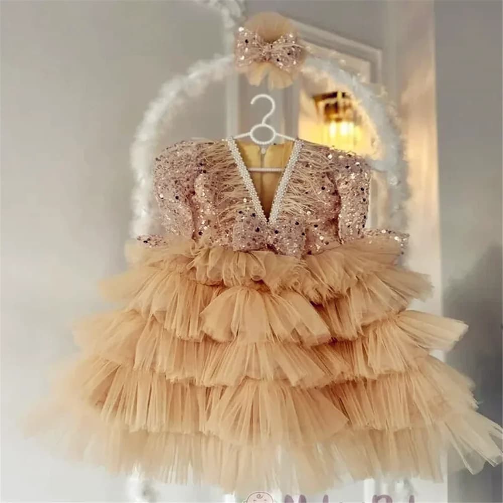 Bellissimo abito da ragazza di fiori champagne in tulle soffice con paillettes manica lunga al ginocchio con fiocco abito da ballo con piume regalo di compleanno per bambini