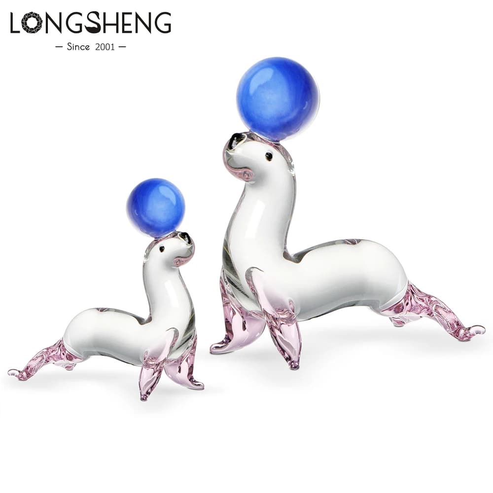 Set di 2 statuette di leone marino di cristallo con sfera da collezione in vetro artistico soffiato a mano, ornamento di animali marini, scultura, decorazione da tavolo, regalo