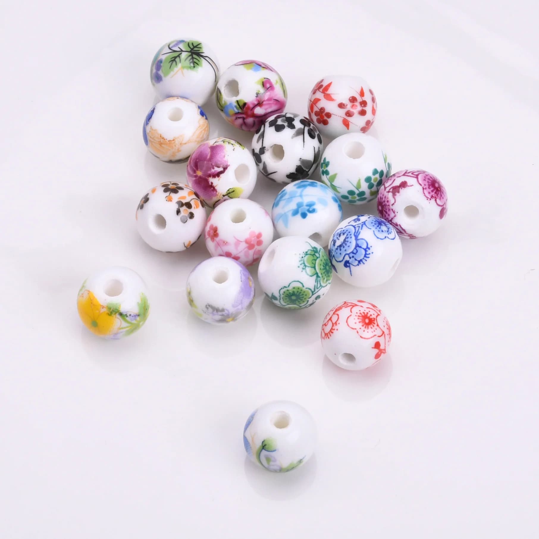 6mm 8mm 10mm 12mm Modelli di fiori rotondi Porcellana ceramica Branelli allentati del distanziatore Lotto per la creazione di gioielli Risultati braccialetto fai da te 10 pezzi