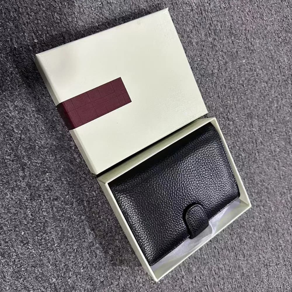 Portafoglio triplo in pelle da uomo Portafoglio per passaporto nero Primo portafoglio corto casual in pelle di vacchetta con strato premium con borsa per il cambio a scatto Nero