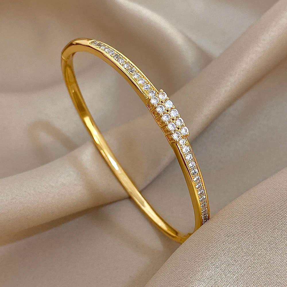Squisiti braccialetti rigidi con zirconi micro intarsiati per le donne Regali di gioielli con bracciale impilato in rame placcato oro