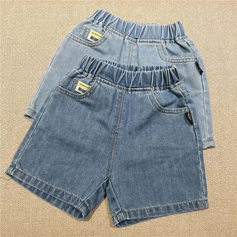 2025 Estate Bambini jeans al ginocchio Ragazzi tinta unita tutto-fiammifero Pantaloni centrali Ragazze pantaloncini di jeans casual dritti