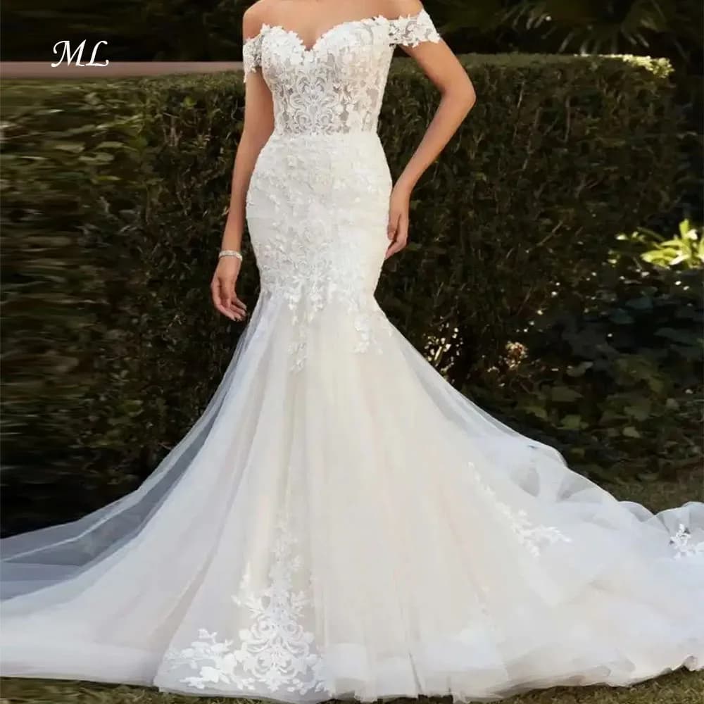 Personalized wedding dresses ML, new, pastoral style, with uncovered shoulders, heart neckline, tulle, mermaid, with applications and extrascicus illusion.