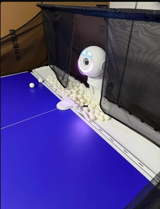 2026 Dora New Style Three-weel Drive Smart Table Tennis Machine with Auto-recycling Net for Ping Pong Ball Training