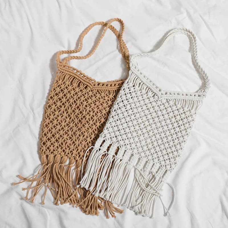 Nuova borsa in paglia con nappa in filo di cotone spesso Borsa a tracolla intrecciata con tracolla cava Borsa da spiaggia casual