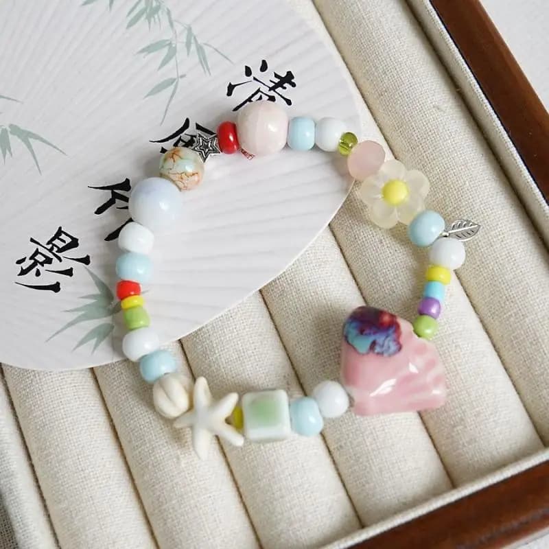 Bracciale con perline stella marina conchiglia in ceramica colorata per le donne Boho Perline di pesce Catena di corda intrecciata Gioielli per feste in spiaggia