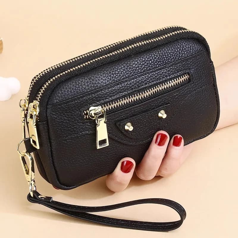 New 2025 Versatile Women's Wallet Woman's Feet Brand Rivetto Royal Top layer in cow leather Hinge Coins Pocket Pocket Keychain Large bag
