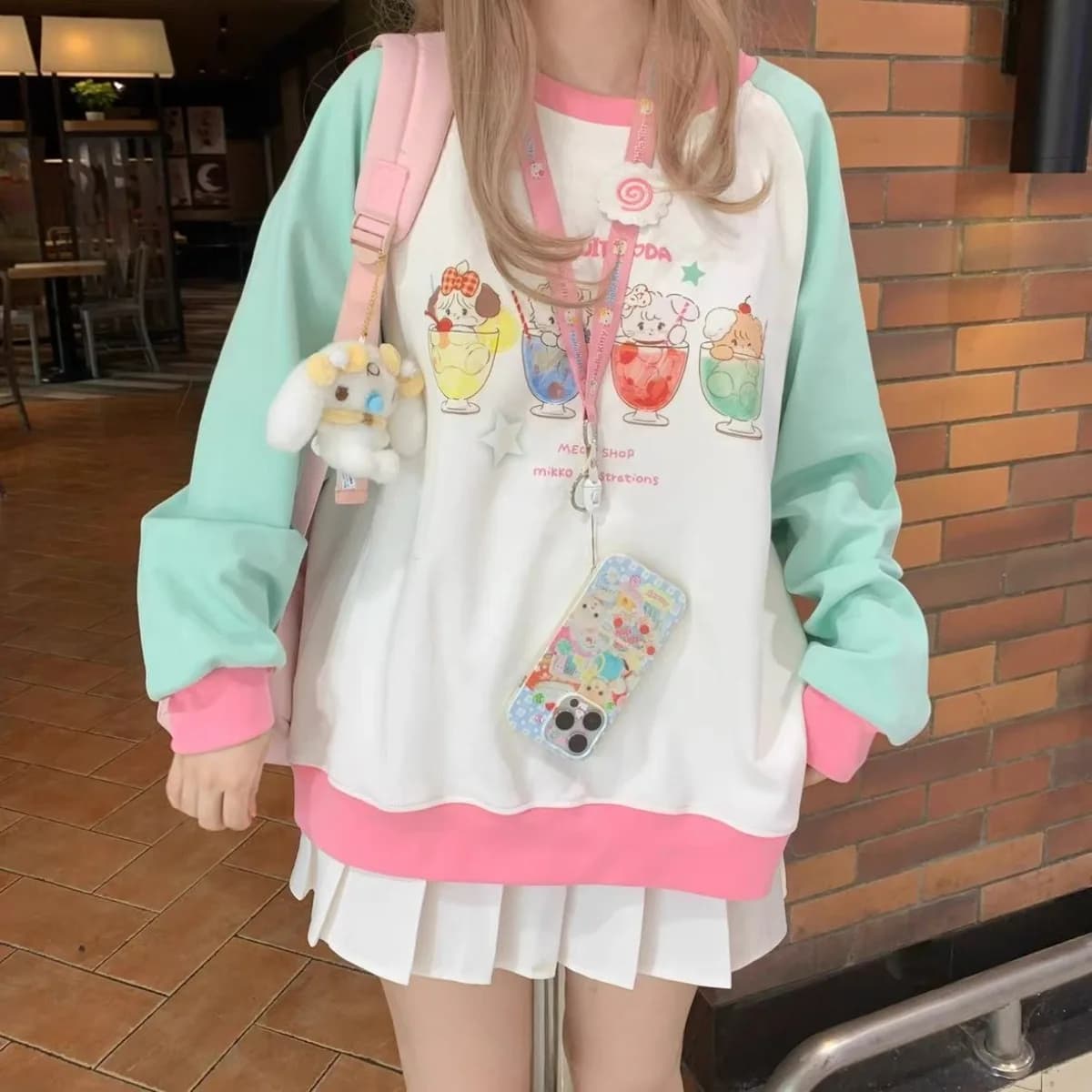 T-shirt moda donna Basic Lady manica lunga Casual allentata modello simpatico cartone animato Top T-shirt oversize Stile versatile di tendenza