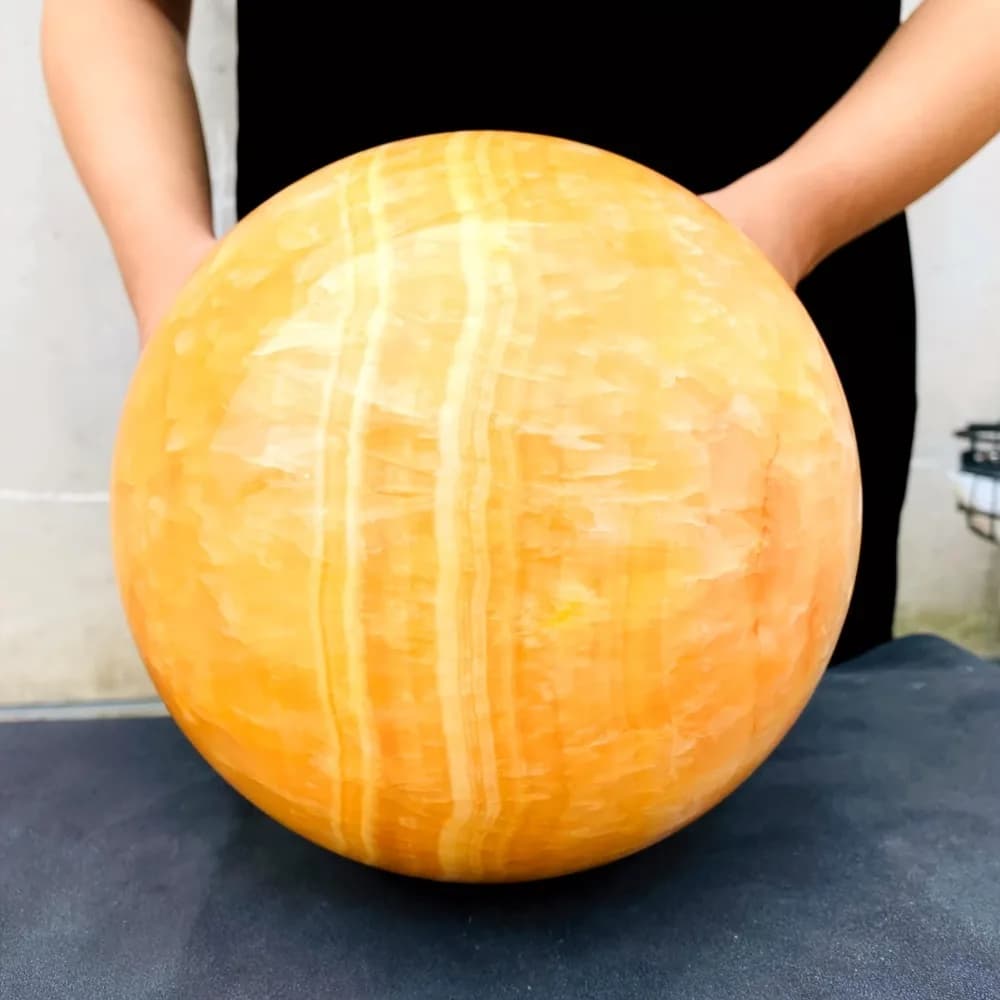 Sfera di calcite gialla da 6,5-7 cm, cristallo di miele, decorazione per la casa, sfera di pietra curativa, strisce, sfera arancione