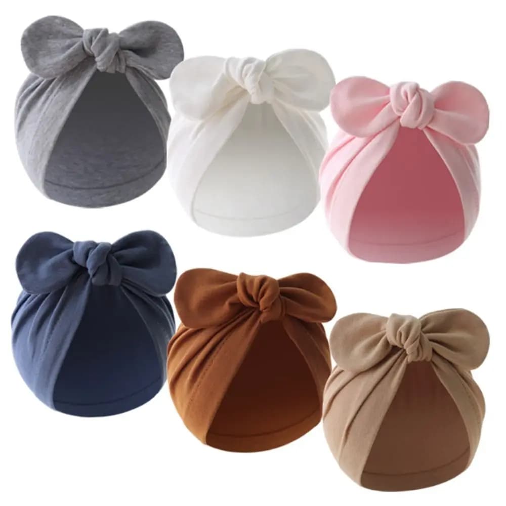 Cappello da bambino con nodo a fiore carino Cappello da coniglio morbido tinta unita Cappello da neonato in cotone Cappello da bambino per bambino