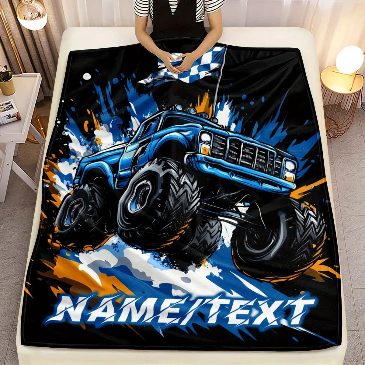 Personalized cool truck flannel blanket with soft and lightweight parabolic shape, featuring a vibrant blue monster truck design