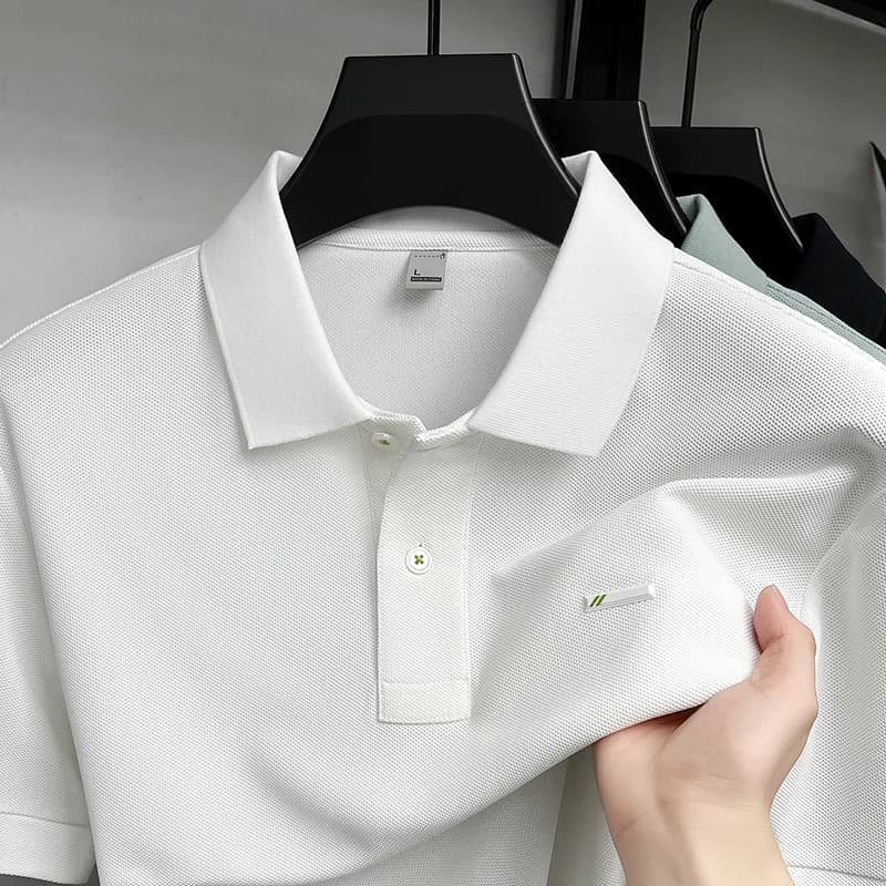 Polo a maniche corte di marca estiva tinta unita comoda e traspirante T-shirt da uomo nuovo design in rilievo top casual alla moda