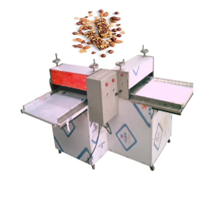 Macchina automatica per tagliare la schiaffo della barra proteica Macchina per la produzione di barre energetiche per cereali al cioccolato