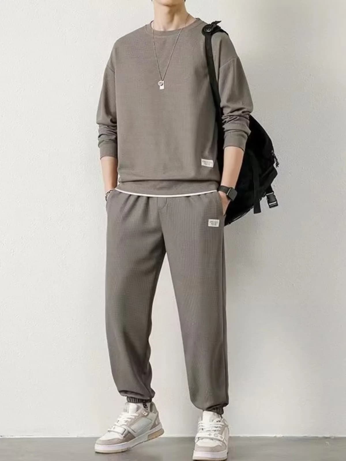 Set di abbigliamento sportivo casual da uomo Felpa e pantaloni larghi in puro cotone Autunno Pantaloni lunghi Sve per giovani Faionable