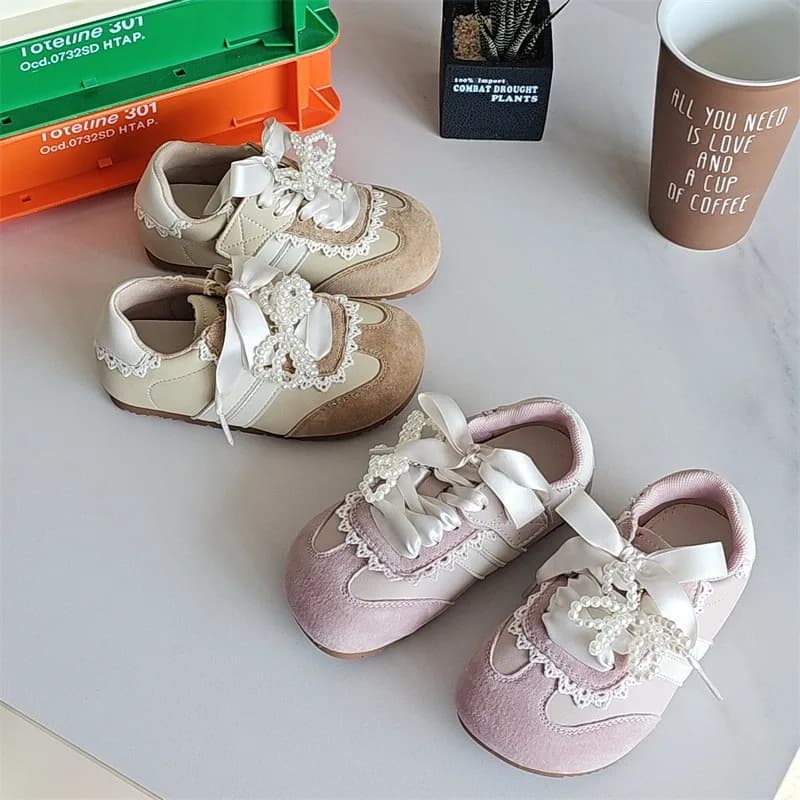 2025 Nuovi ragazzi e ragazze Sneakers Primavera Autunno Moda Scarpe con fiocco in pizzo Bambini Causale Versatile antiscivolo Scarpe per bambini traspiranti