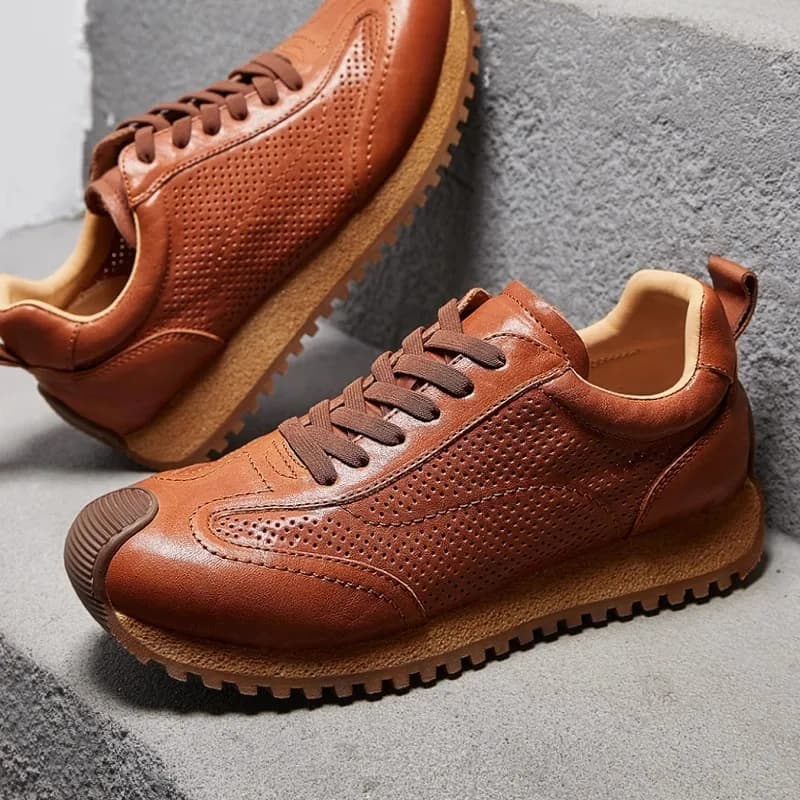 Scarpe da ginnastica estive da uomo in pelle di mucca traspirante scava fuori scarpe casual leggere alla moda scarpe sportive da trekking all'aperto
