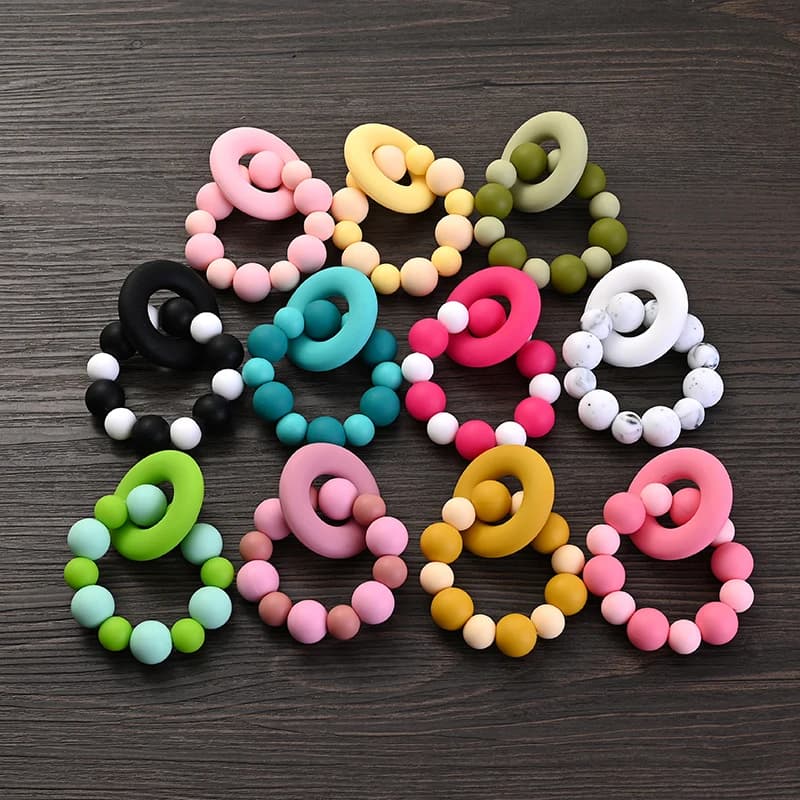 Ciondolo ad anello per massaggiagengive in silicone per bambini Perline rotonde in silicone per uso alimentare Bracciale con sonaglio Giocattoli per la dentizione del bambino Giocattoli da masticare per la cura sicura