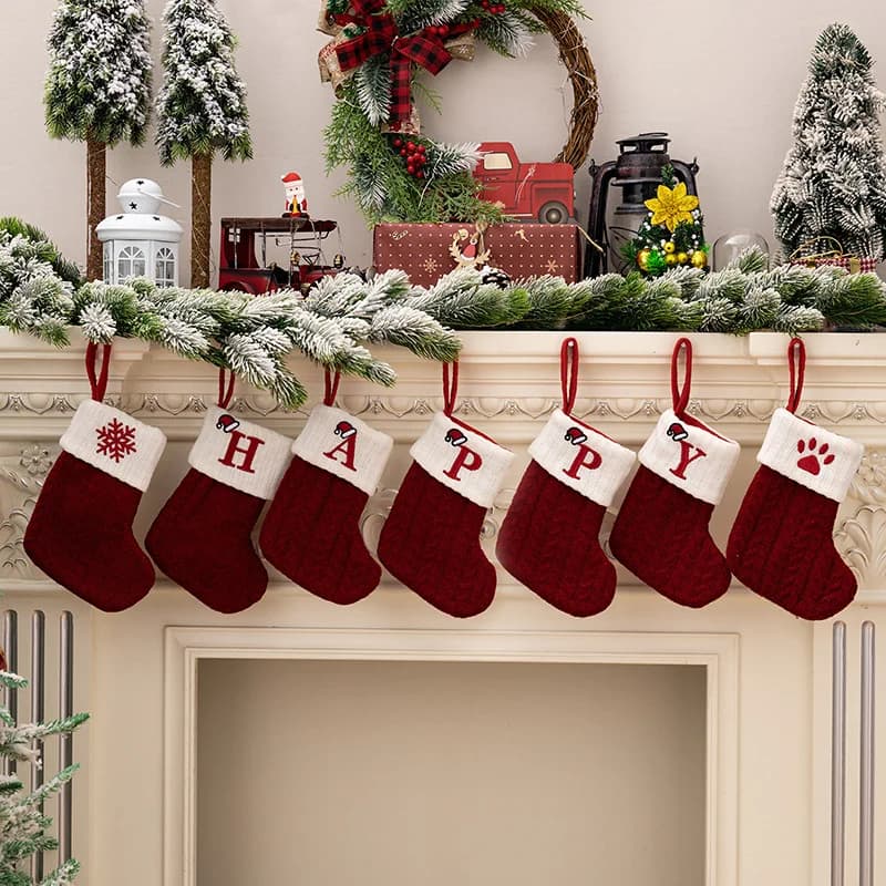 Christmas socks with creative letters Christmas tree ornaments Knitted socks in Christmas yarn Decorative pins Socks with Christmas letters