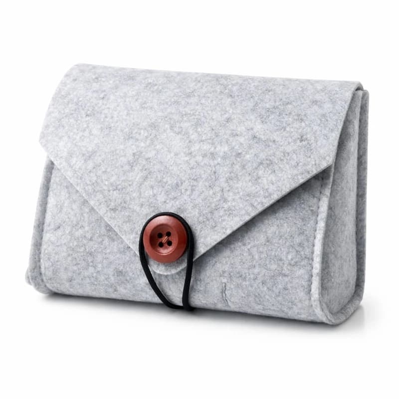 Borsa protettiva semplice, compatta e portatile in feltro per caricabatterie per Macbook, mouse, power bank, auricolari e accessori digitali.
