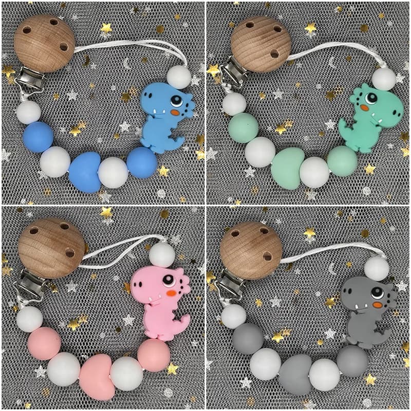 Clip per ciuccio in silicone per bambini Clip per porta ciuccio con perline di dinosauro di faggio rotondo per massaggiagengive Giocattolo da masticare per allattamento Regalo con catena per capezzoli lenitivo