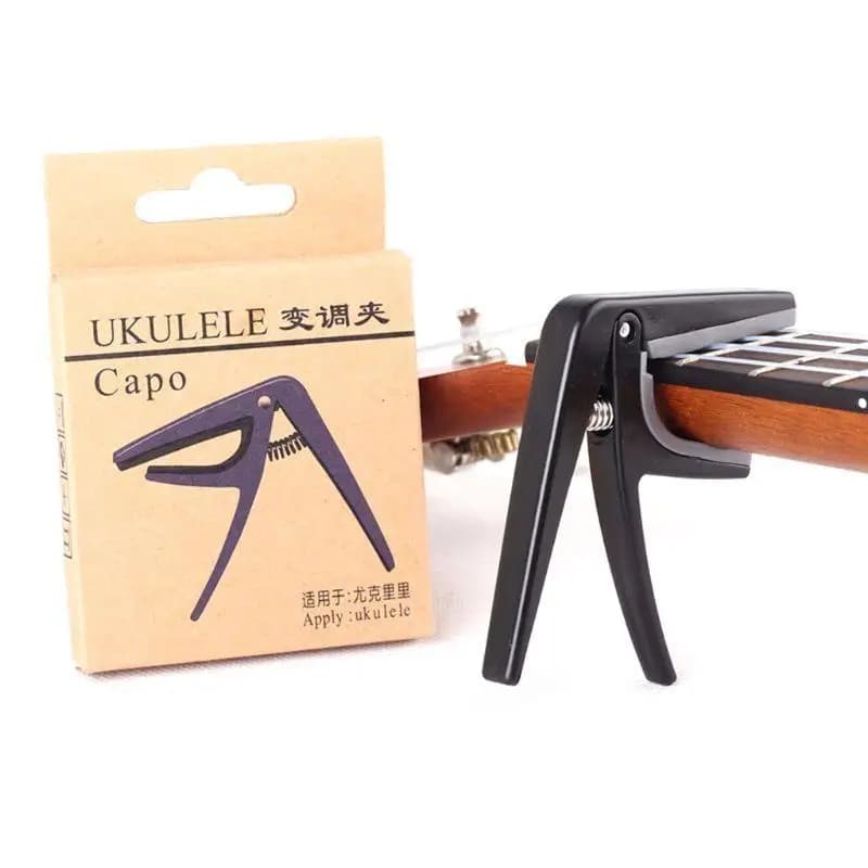 652F Capotasto per Ukulele a 4 corde Capotasto per chitarra professionale Capotasto per chitarra con cambio rapido a mano e