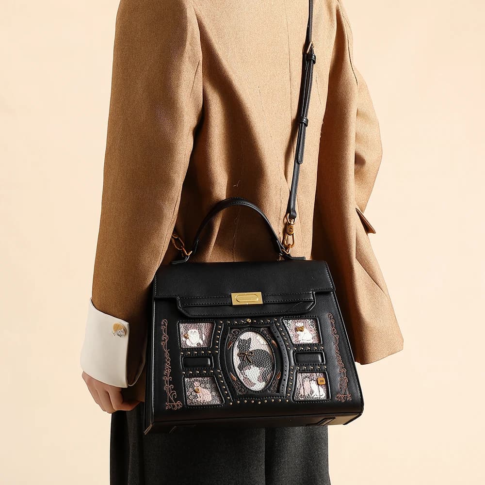 Women's handbag 2026 autumn and winter new fashion niche design cartoon cat large capacity crossbody bag commuting versatile tot
