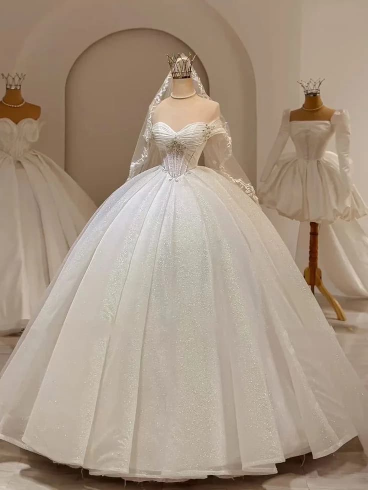 Abito da sposa di lusso scintillante a ball gown con spalle scoperte, in tulle glitterato, con corsetto e allacciatura posteriore, personalizzabile per la sposa