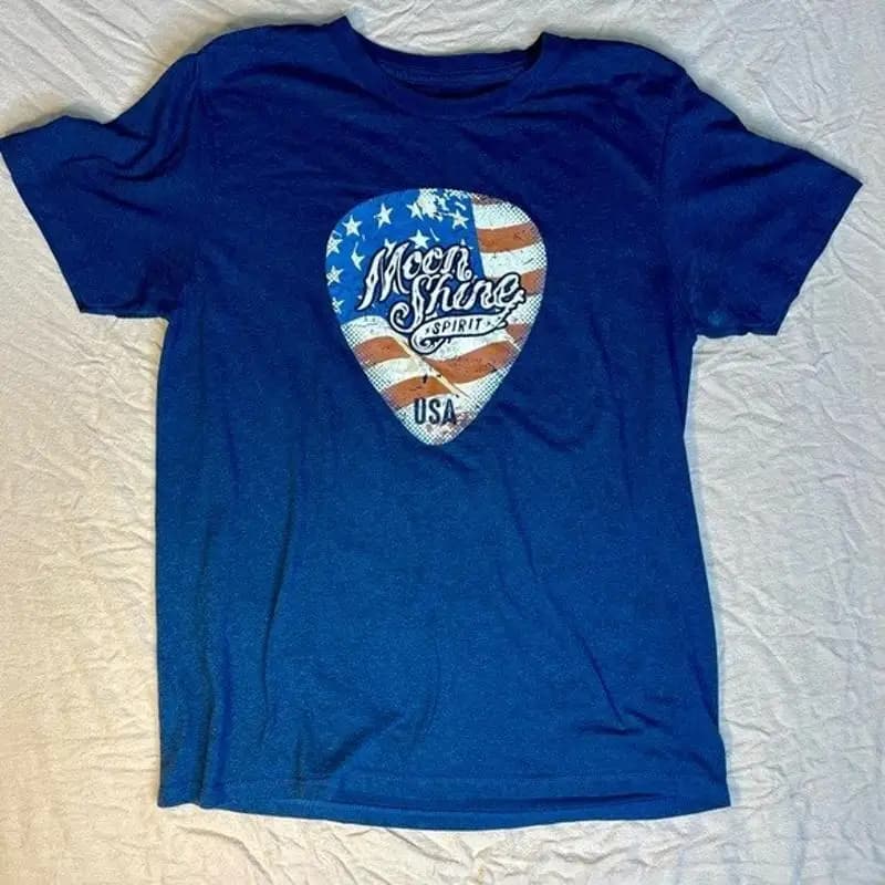 Moon Shine Spirit di Brad Paisley Maglietta con plettro per chitarra con bandiera americana media