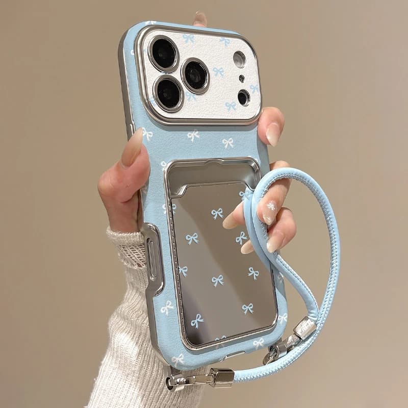 Cute Bow Mirror Card Holder Phone Case For iPhone17 16 15 14 13 Pro Max, Blue Ribbon Wallet Card Slot Case With Wrist Strap,
