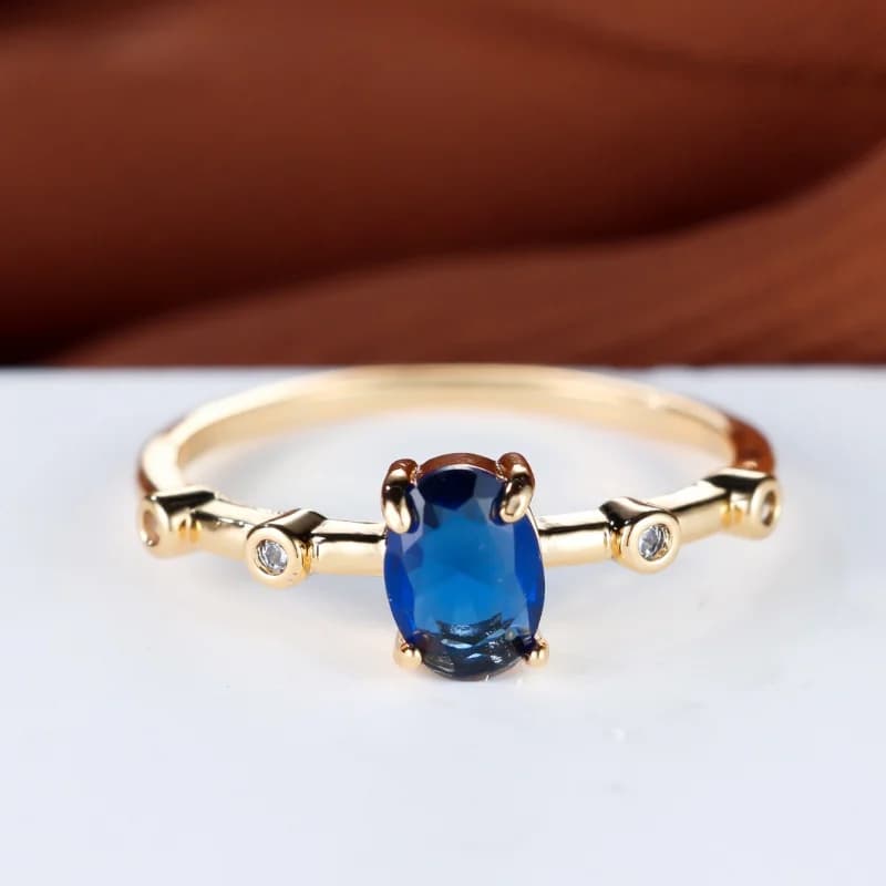 European and American New Minimalist Oval Blue Slim Ring, Light Luxury Daily Women's Four Claw Commuting Versatile Accessory